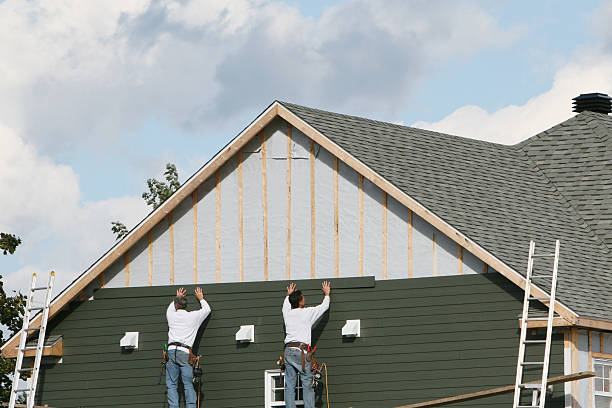 Professional Siding Installation technician working in West Liberty, OH